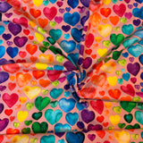 Jersey coton / élasthanne coeurs multicolors fond rose- 2213112TR