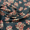 100% cotton Small flowers shades of pink background old dark blue (country road)
